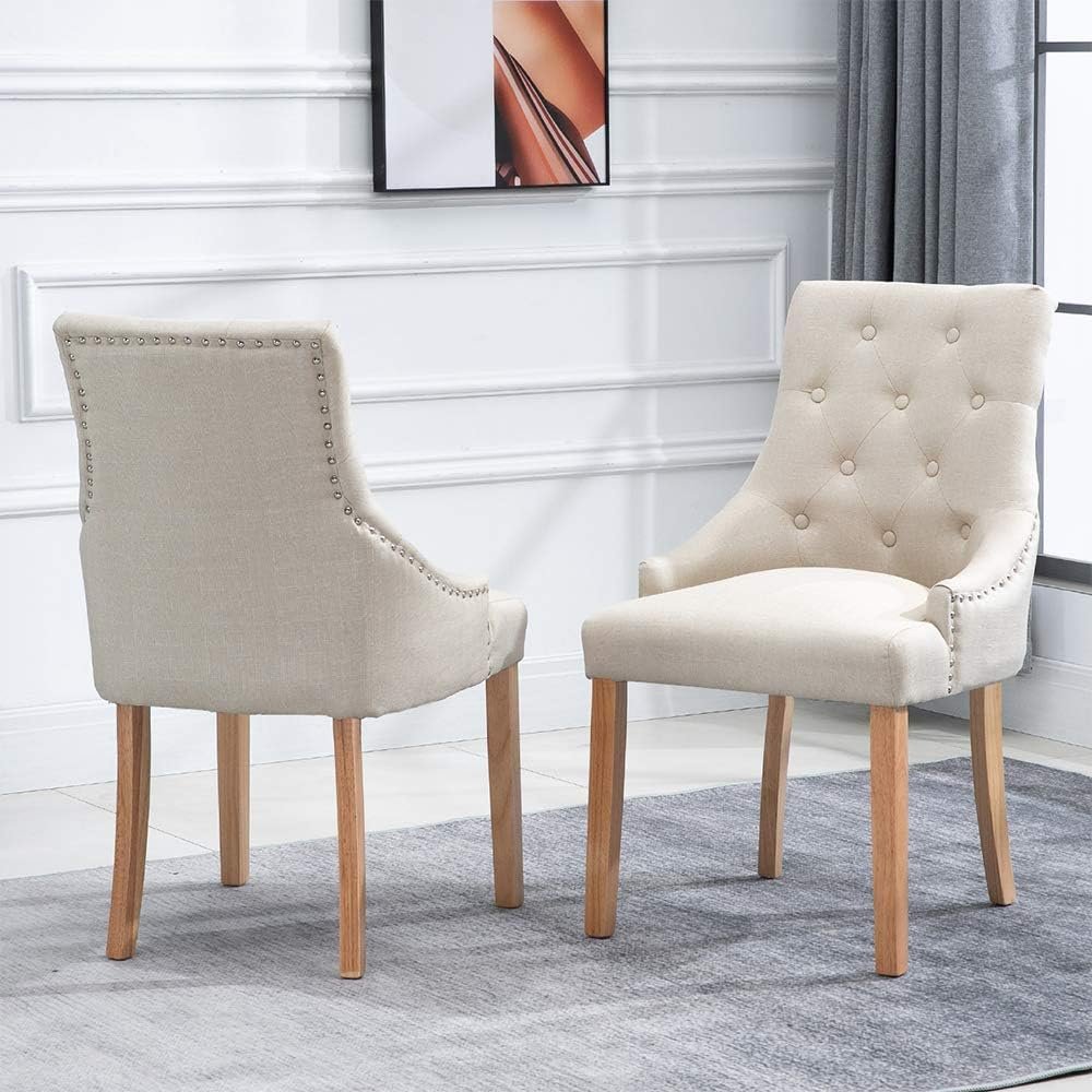 A set of cream dining chairs